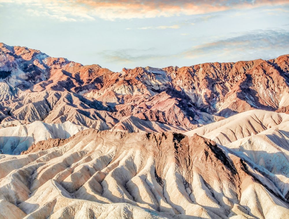 The sculpted, sunlit badlands of Zabriskie Point in Death Valley National Park